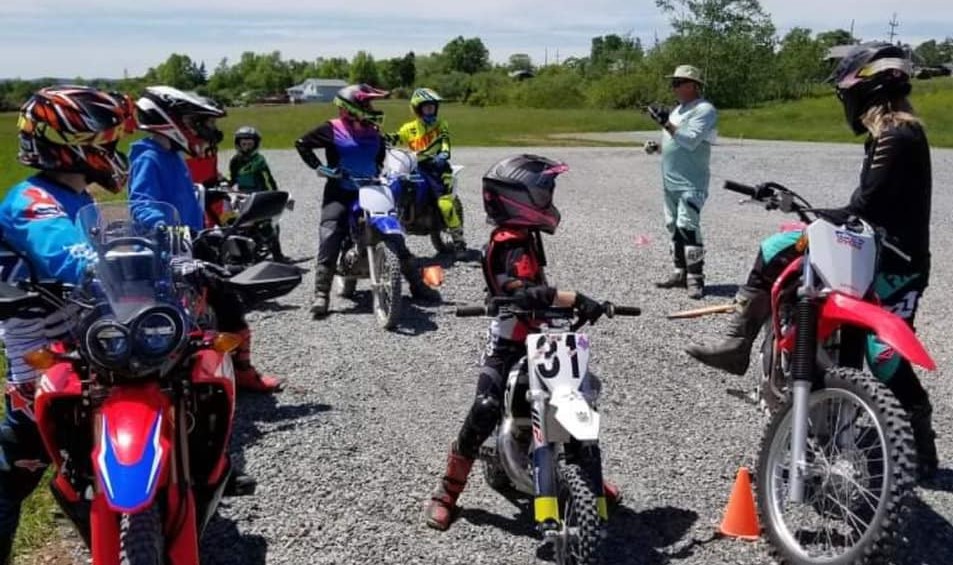 Riders listening to instruction