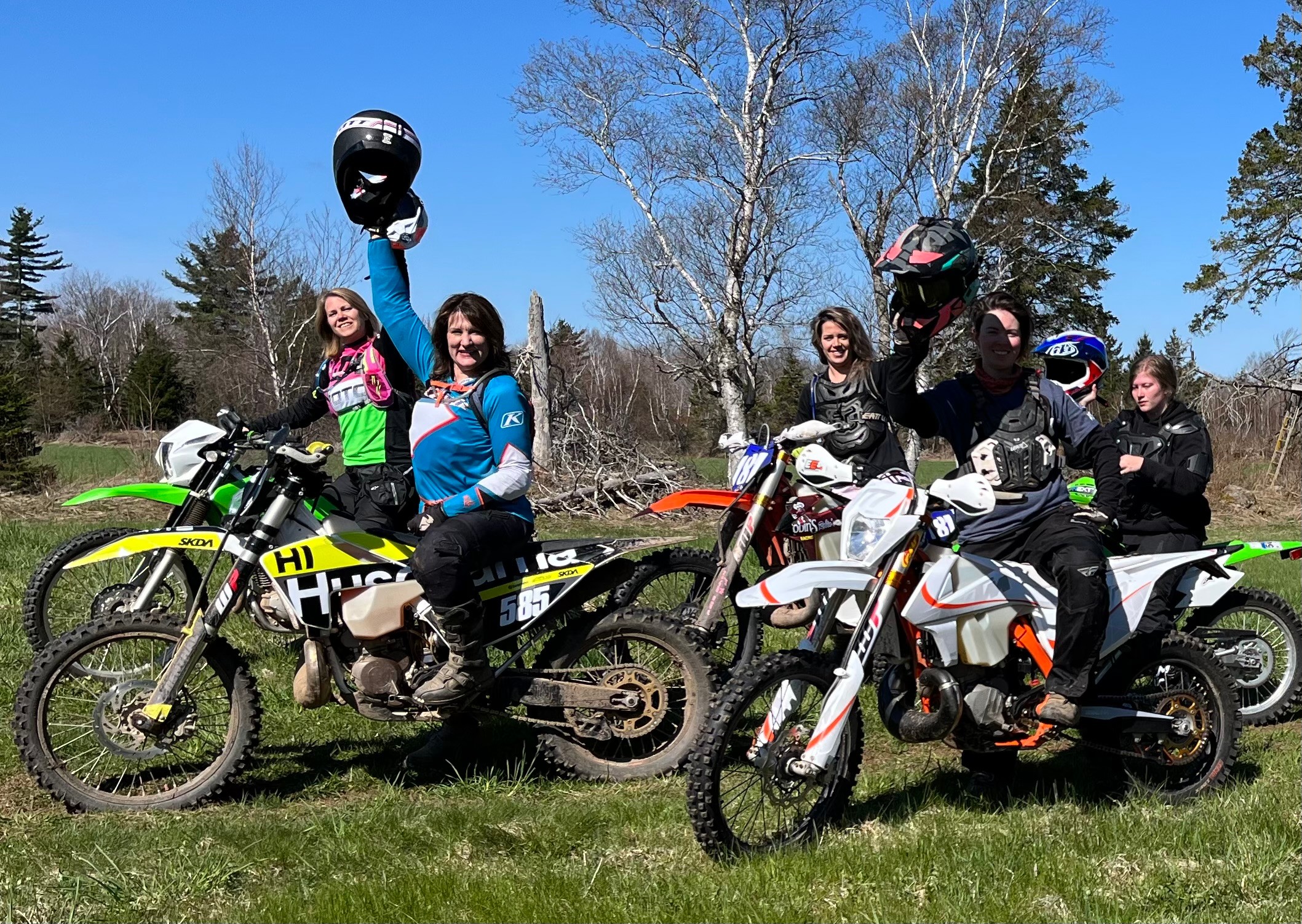women on their dirt bikes at Foote's property