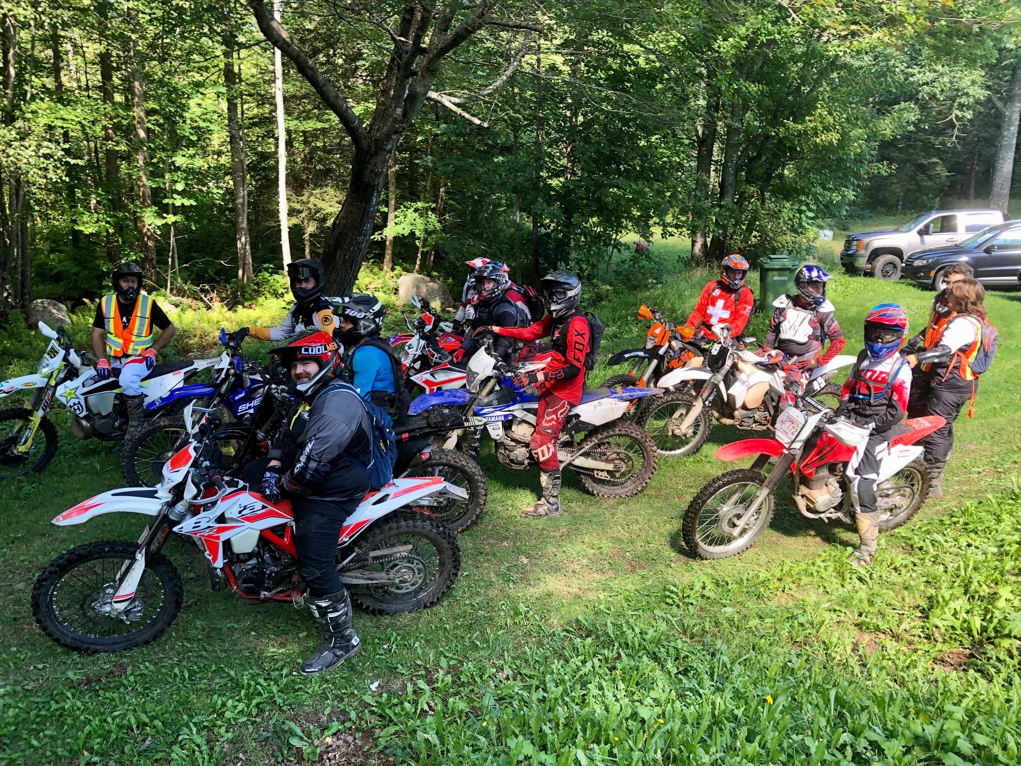 Dirt bike riders getting ready to head into the woods