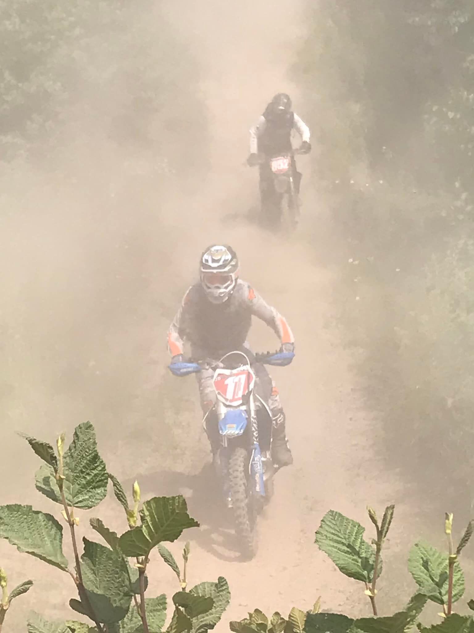 Two racers coming down a Craigmore hill with dust flying