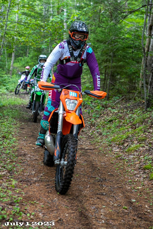Line of riders on the trail