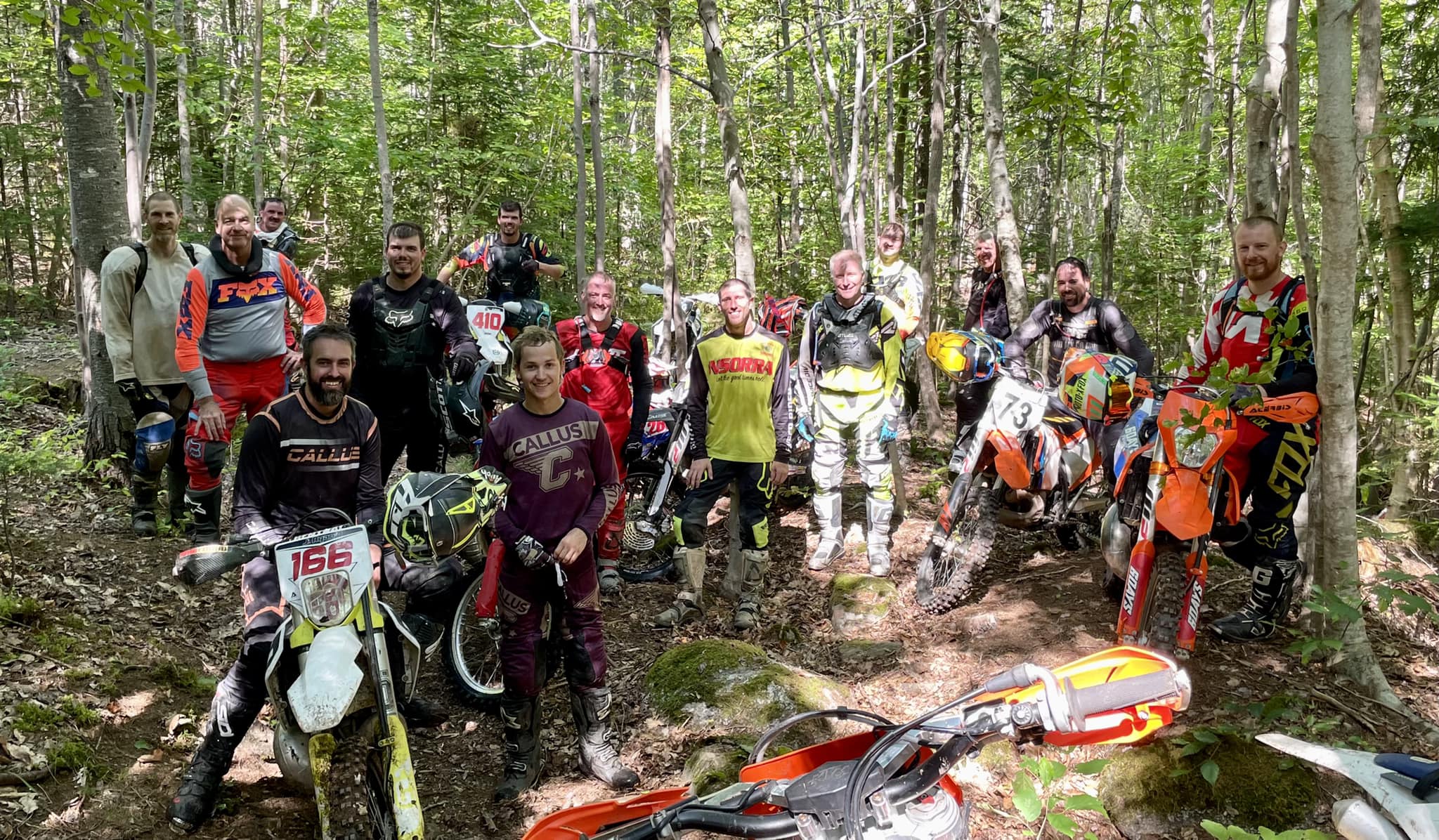 Group of offroad riders in the woods