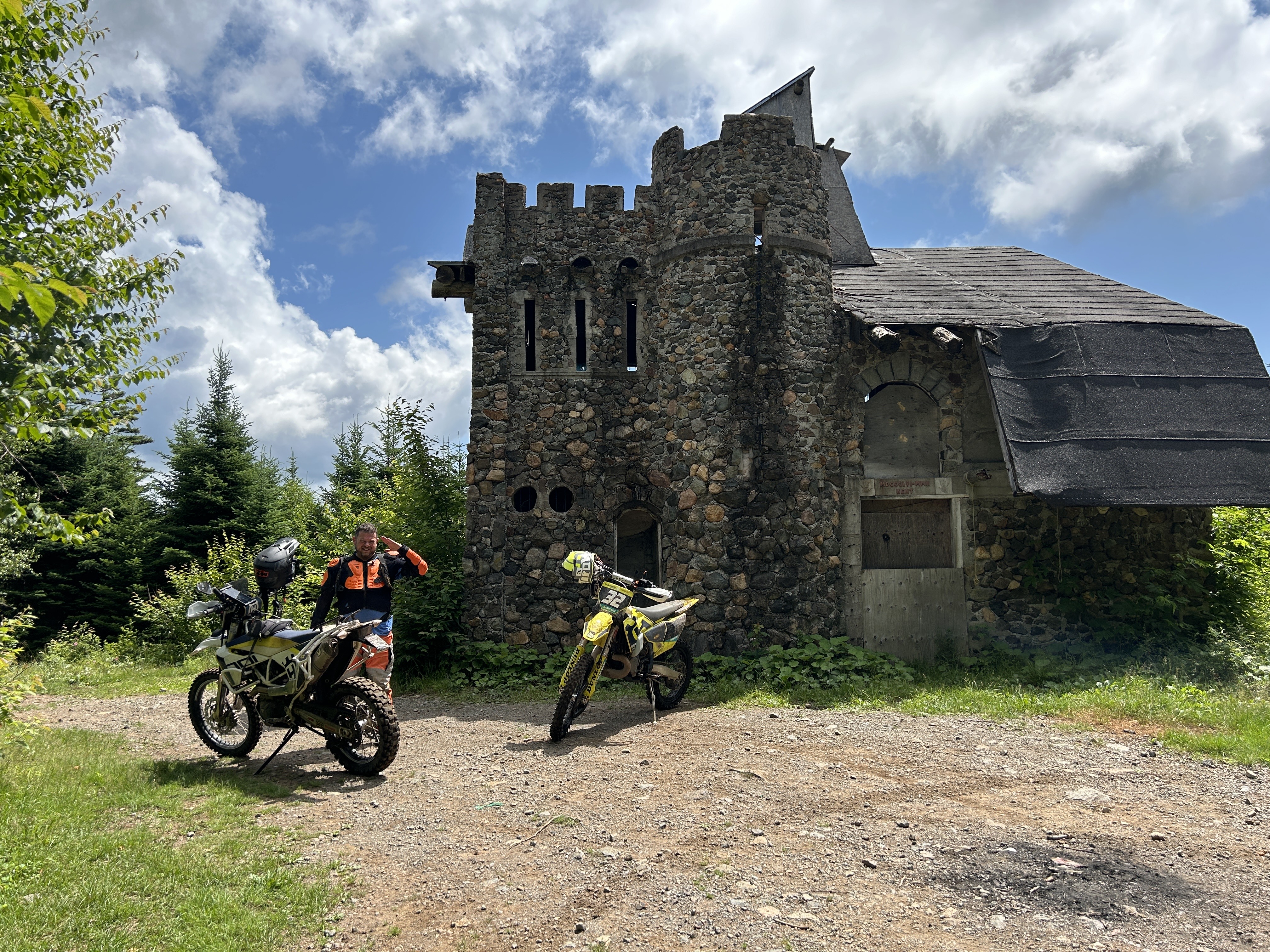 Dirt bike rider in front of a castle