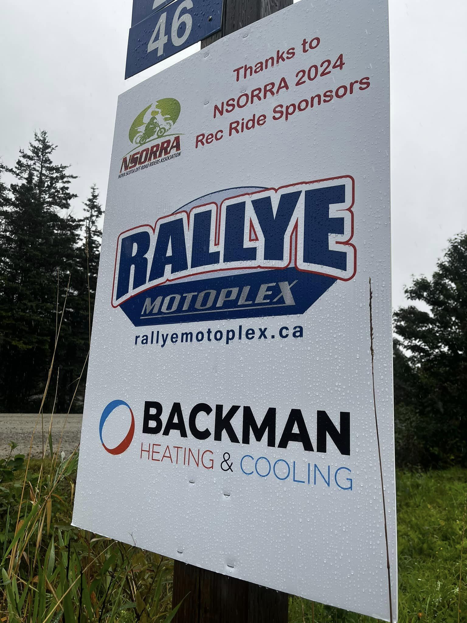 Sponsor poster with Rallye Motoplex and Backman Heating and Cooling logos