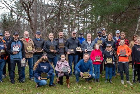 Hare scramble winners, sponsors and landowners in a group photo