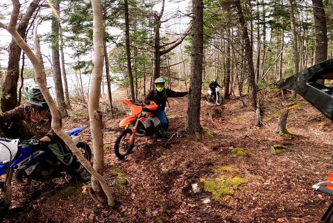 Riders in the woods on their bikes during a rec ride in Yarmouth
